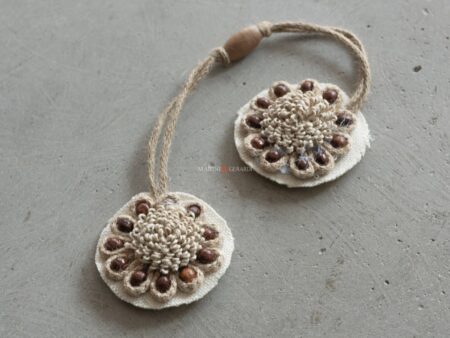 Fermatenda a calamita per tende con semi d'albero particolare